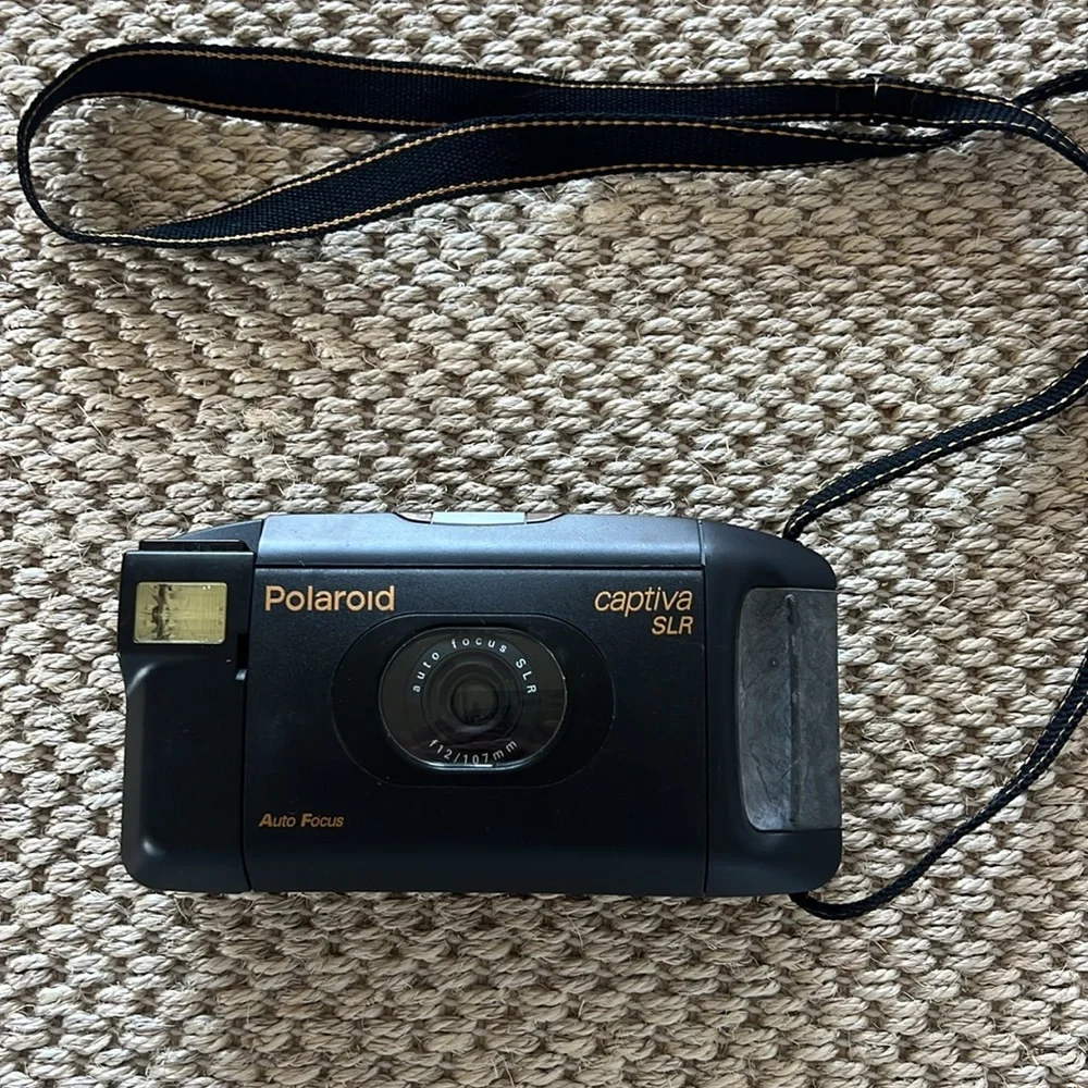 Polaroid 95 film camera captiva auto focus SLR